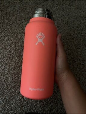 hydroflask 32oz wide lid tumbler in bright fluorescent neon coral orange pinky